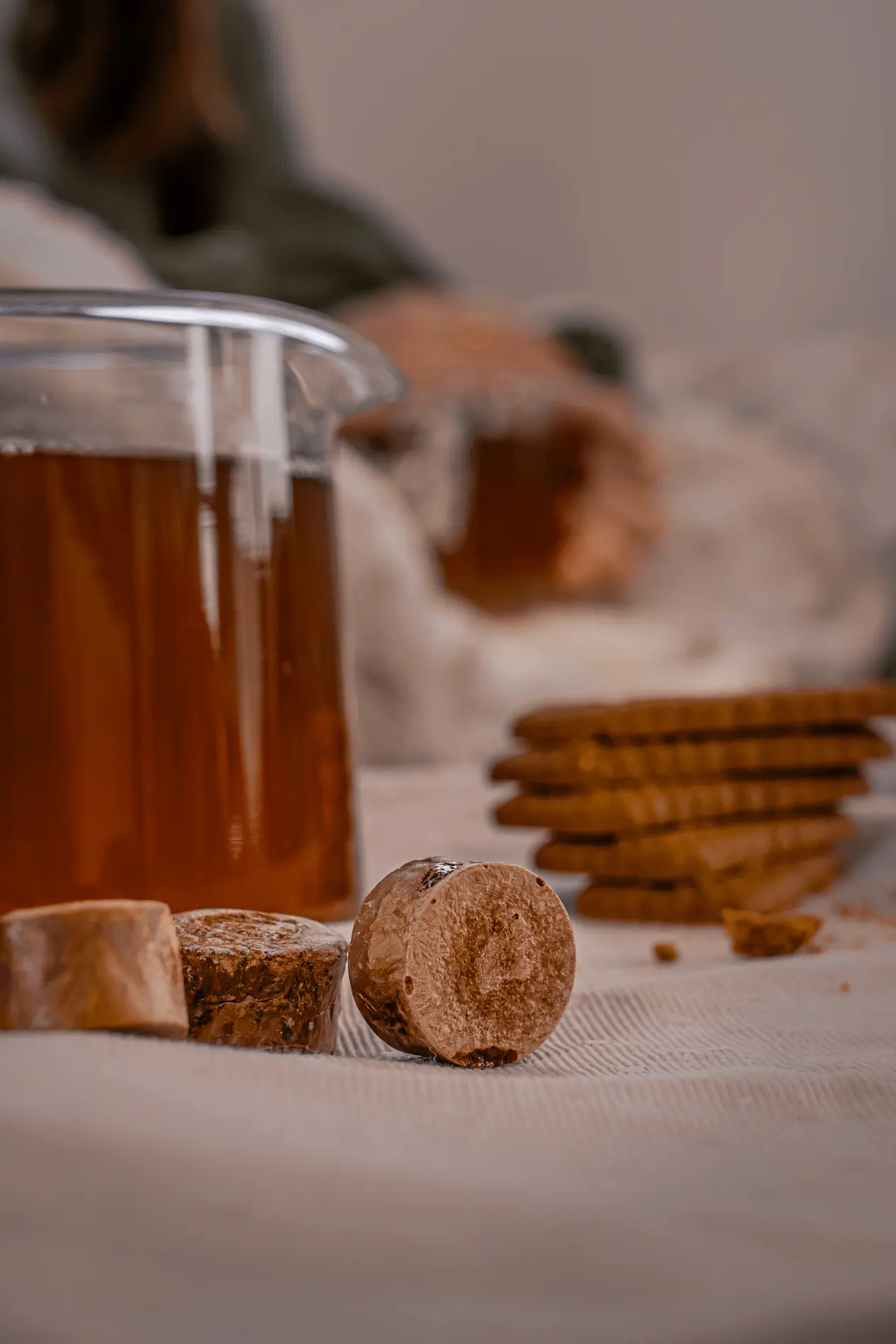 Capsules Instan’T et biscuits en ambiance lifestyle cocooning.